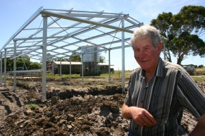 Dad with the dairy under construction